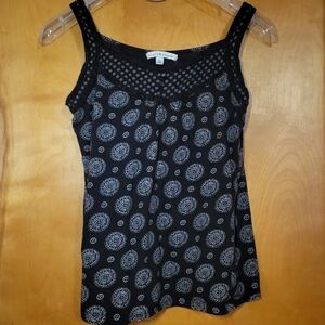 Sleeveless Black Top With White, Ornate Circular Pattern And Lace Detailing